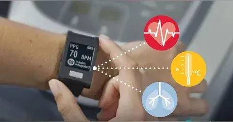 Smartwatch showing heart rate monitor with icons representing heart health, temperature, and respiration, representing health and sensor integration.